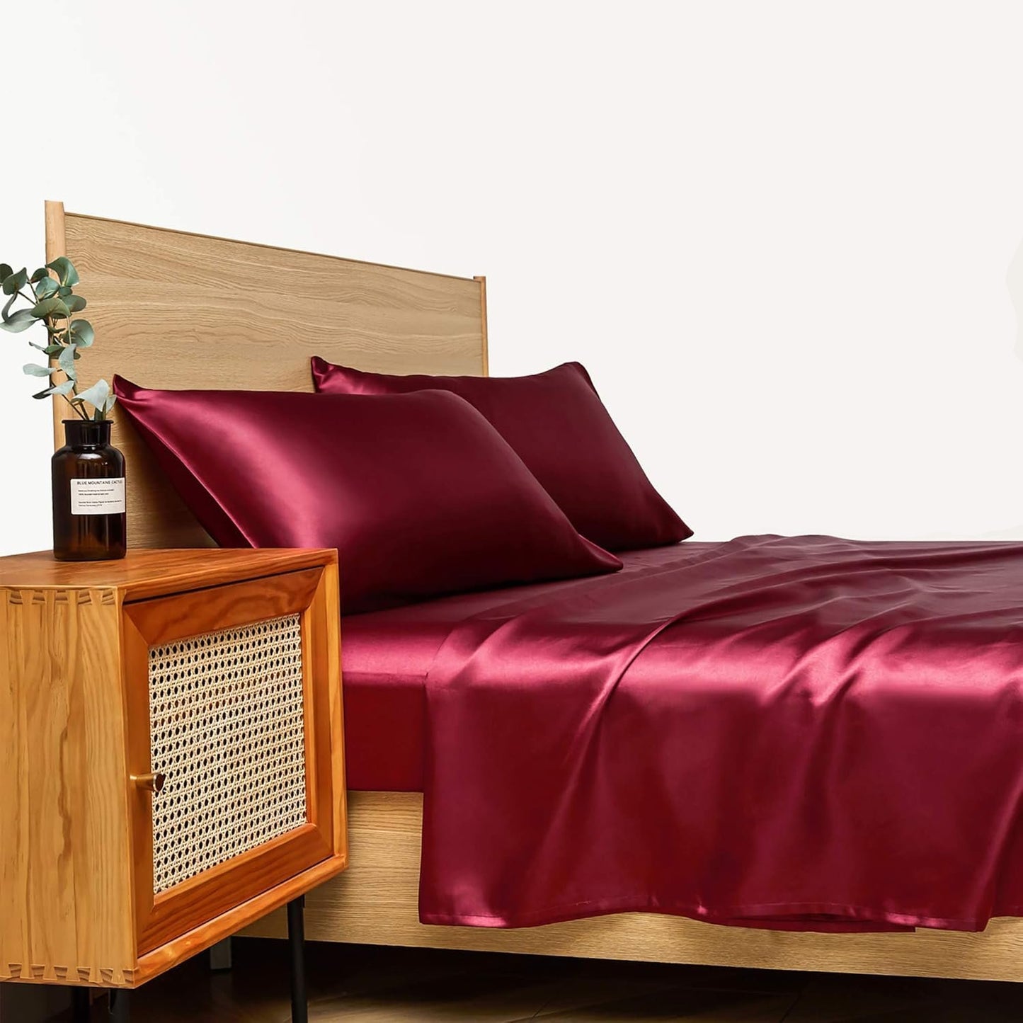 VibeCore Aesthetic Sleek Satin Duvet Cover Set in wine red, side view, highlighting the rich satin fabric and smooth texture, adding a touch of elegance to your bedroom or dorm.