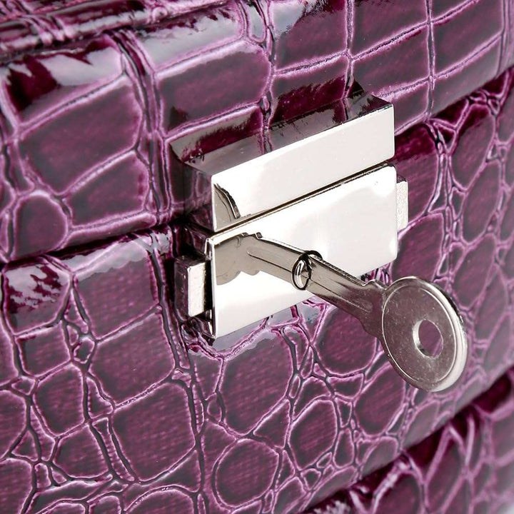 3-Layer Leather Jewelry Box Purple with secure lock feature for added safety and protection of jewelry.