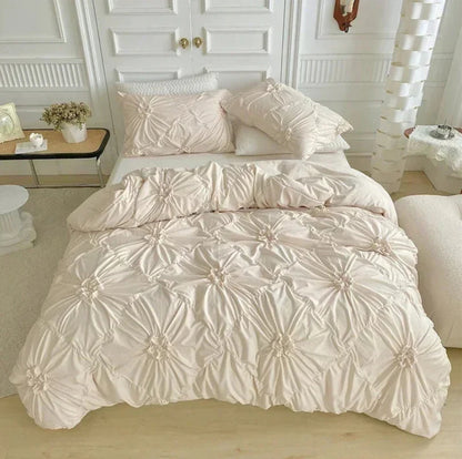 Aerial view of the VibeCore Aesthetic Tufted Floral Pattern Duvet Cover Set in beige, showcasing its soft, textured floral blooms and sleek design that adds a cozy yet modern touch to any bedroom or dorm, creating an aesthetic and inviting atmosphere.