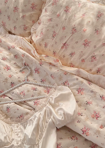 Floral patterned fabric with a hanger on a matching background