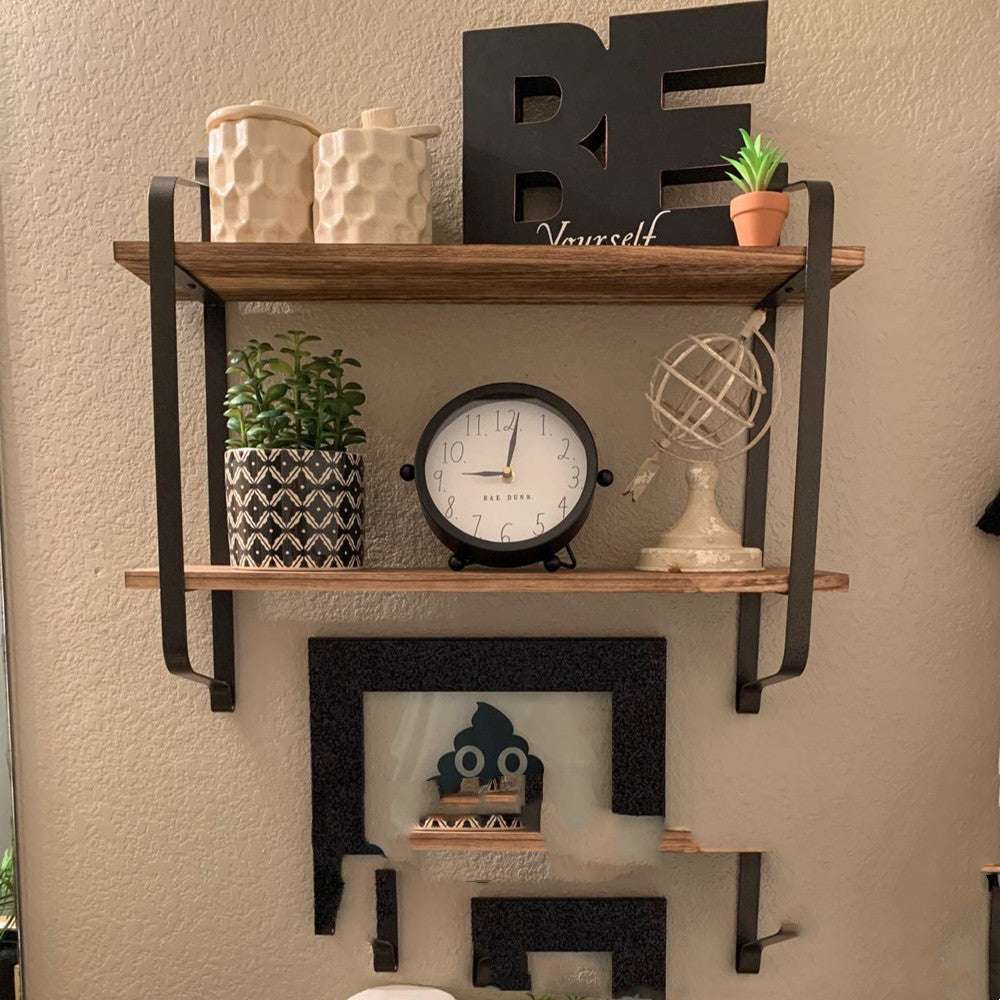 Positioned above a toilet, this shelf features durable Paulownia wood and black matte steel, perfect for organizing toiletries and adding rustic charm. Keywords: 2-tier shelf, rustic floating shelf, bathroom storage, above toilet shelf, Paulownia wood, matte steel, home decor, bathroom organizer, industrial decor, versatile storage.