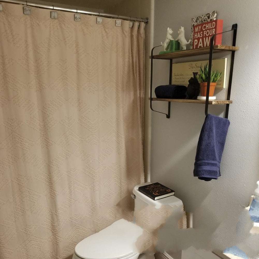 Alternative view in a bathroom, highlighting the sturdy Paulownia wood shelves and black matte steel frame, perfect for organizing and displaying bathroom essentials. Keywords: 2-tier shelf, rustic floating shelf, bathroom storage, Paulownia wood, matte steel, bathroom organizer, home decor, industrial style, bathroom shelf, versatile storage.