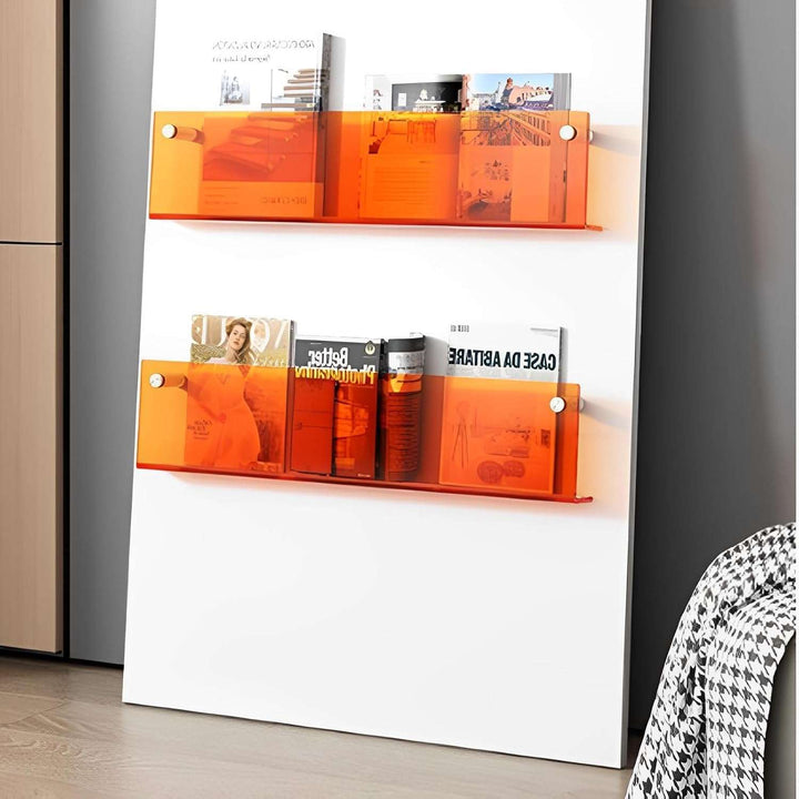 VibeCore Acrylic Wall Mounted Floating Magazine Shelf in orange, angled front view highlighting its vibrant color and sleek, modern design for organizing and displaying essentials.