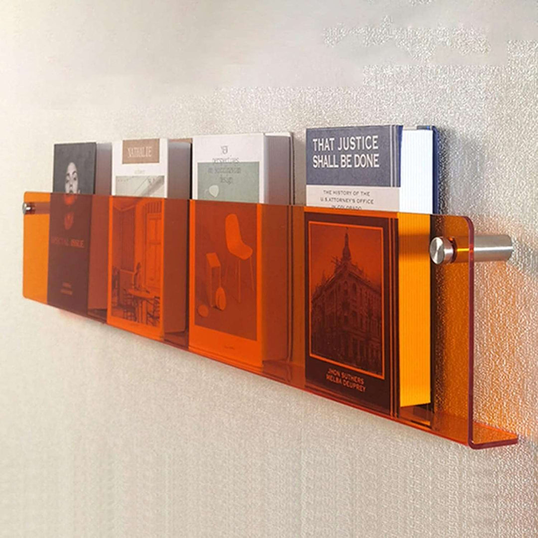 VibeCore Acrylic Wall Mounted Floating Magazine Shelf in orange, side view showing the sleek, minimalist design, perfect for organizing and displaying magazines or decor.
