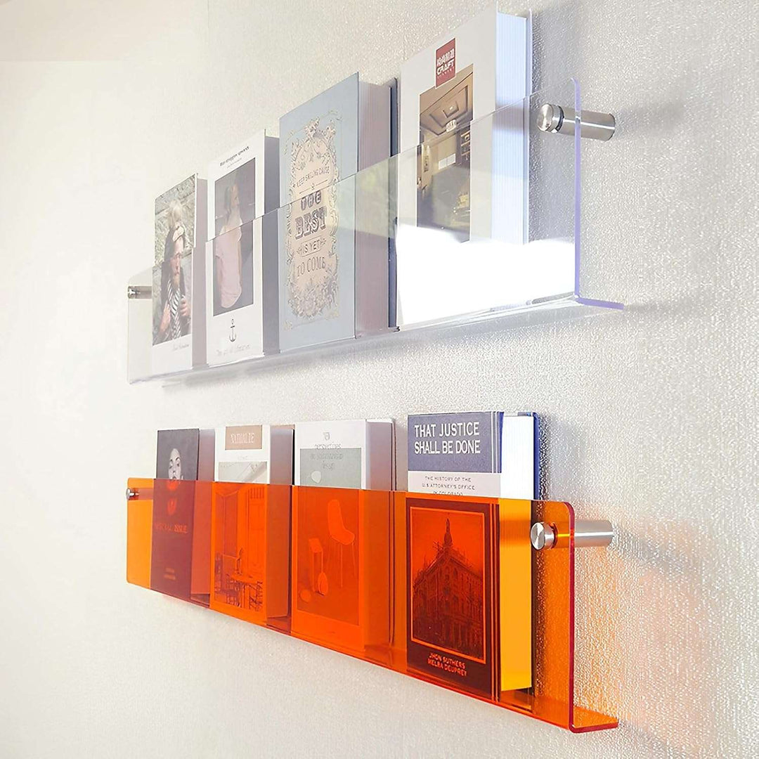 VibeCore Acrylic Wall Mounted Floating Magazine Shelf in transparent and orange, side view highlighting its sleek design, ideal for organizing and displaying magazines, books, and decor.
