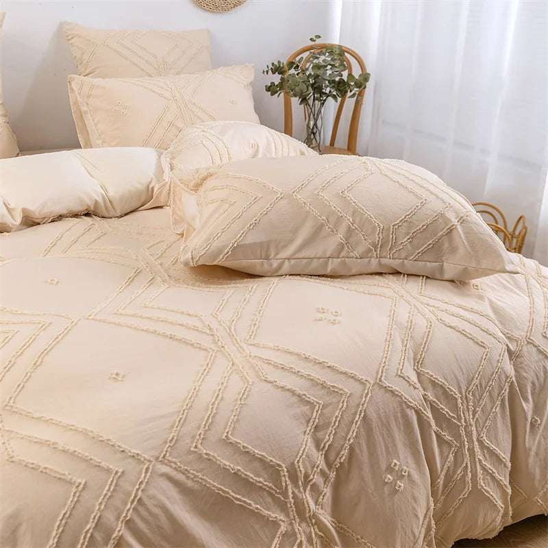 Close-up view of the VibeCore Aesthetic Free Spirit Tufted Duvet Cover Set in beige, highlighting its intricate tufted pattern and soft, textured fabric. The neutral tones and cozy design add a warm, bohemian vibe to your space.