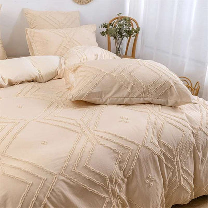 Close-up view of the VibeCore Aesthetic Free Spirit Tufted Duvet Cover Set in beige, highlighting its intricate tufted pattern and soft, textured fabric. The neutral tones and cozy design add a warm, bohemian vibe to your space.