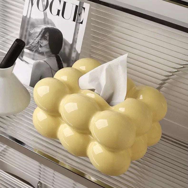 VibeCore Marshmallow Ceramic Tissue Box in yellow, placed on a shelf, showcasing its pastel charm and aesthetic appeal.