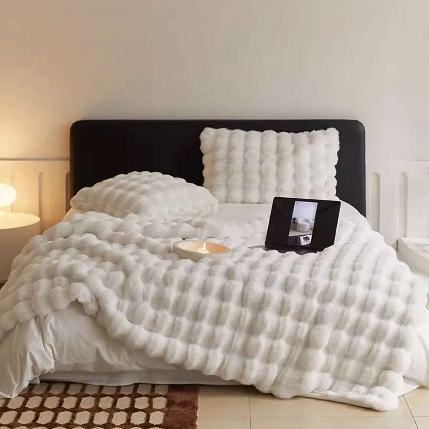 VibeCore Marshmallow Ultra Plush Blanket White On A Large Bed looking soft and luxurious.