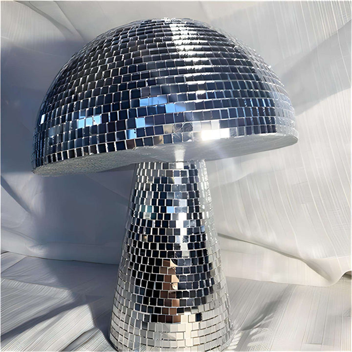 Close-up view of the VibeCore Mushroom Disco Ball, highlighting its detailed reflective surface and mushroom-shaped design, capturing the vibrant light patterns it creates.