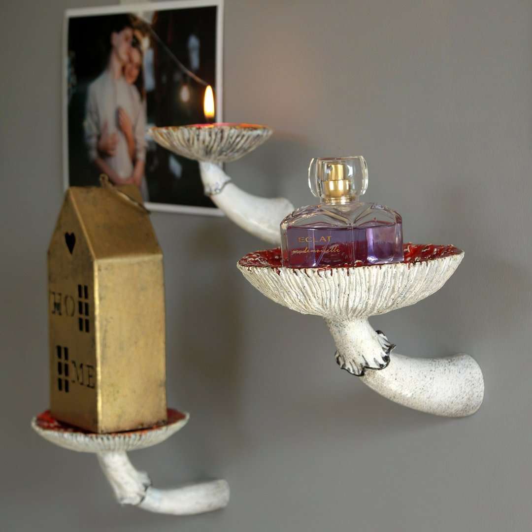 VibeCore Mushroom Wall Shelf featuring 2 mushrooms, one holding a small candle and the other holding a perfume bottle, adding a whimsical cottagecore touch with resin craftsmanship.
