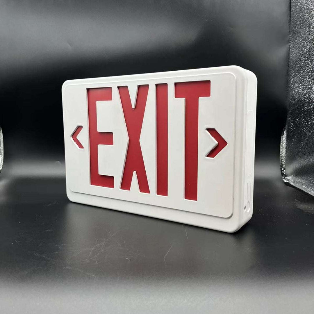 Add a bold, industrial touch to your space with the VibeCore Retro Exit Light Sign in red, viewed from an angled front perspective. This LED-lit sign brings an edgy, urban vibe to any room, with its striking red glow and retro-inspired design. Perfect for grunge room decor, alt decor, or industrial-themed spaces, this sign creates a dynamic, eye-catching focal point. Whether displayed in your grunge bedroom or enhancing your modern aesthetic, it delivers a distinctive, vintage lighting effect that’s both co