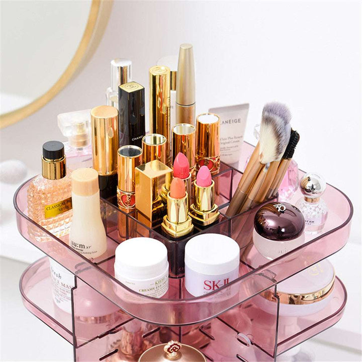 Close-up top view of the VibeCore Rotating Colorful Transparent Makeup Organizer in mauve, highlighting its durable acrylic design, vibrant aesthetic, and 360° rotation.