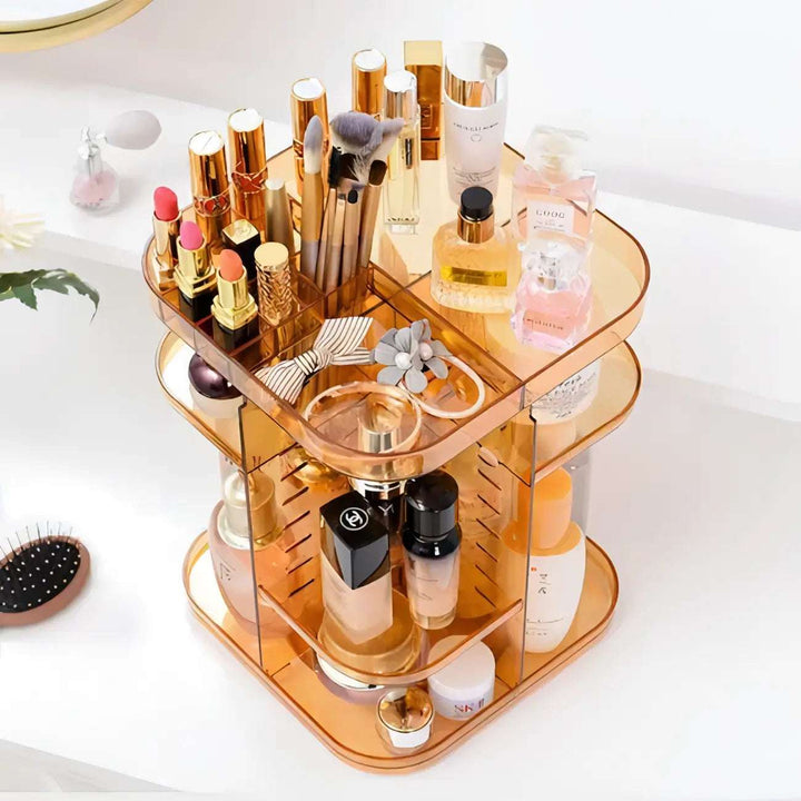 Top view of the VibeCore Rotating Colorful Transparent Makeup Organizer in orange, highlighting its sleek acrylic design and 360° rotating feature for effortless access.