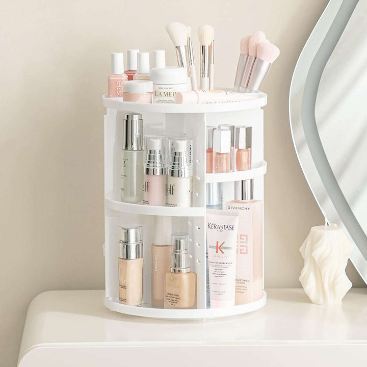 VibeCore Rotating Makeup Organizer in White with beauty products on it, showcasing sleek 360° rotation, adjustable compartments, space-saving design, perfect for cosmetics, skincare, and jewelry, keeping vanity or bathroom storage organized and accessible.