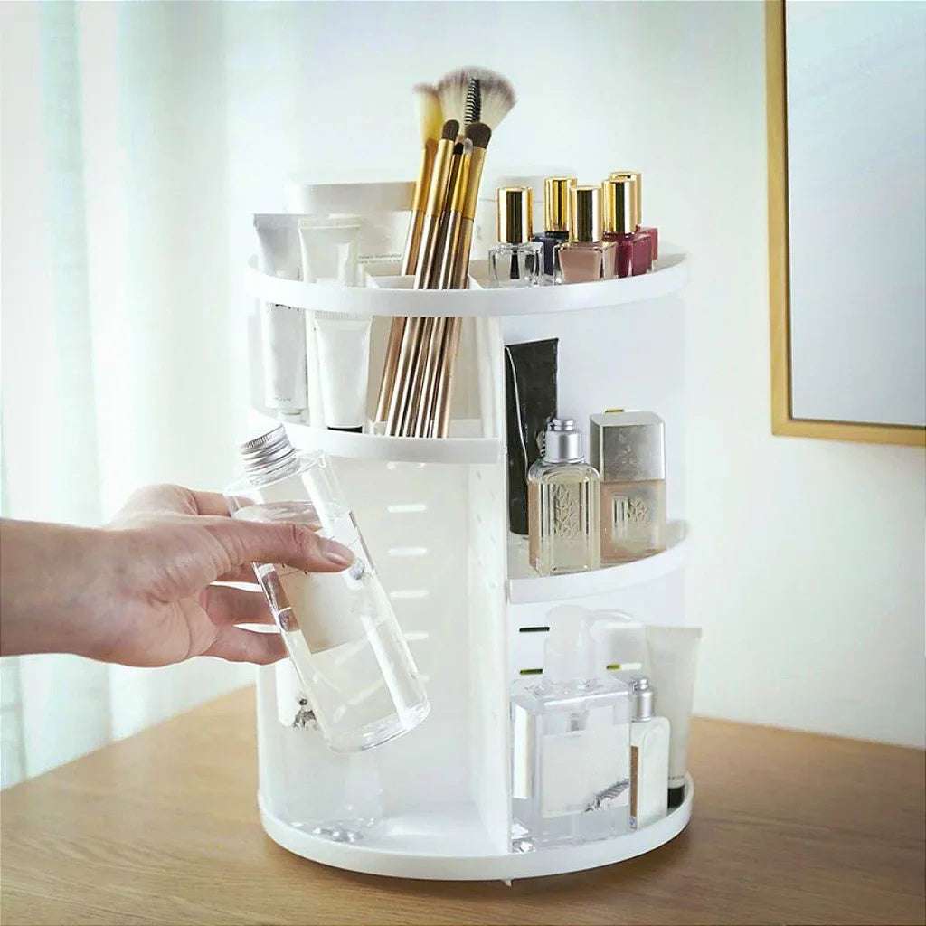 VibeCore Rotating Makeup Organizer White in use, showcasing sleek design, 360° rotation, acrylic makeup holder, vanity organizer, beauty storage solution, cosmetic organizer, jewelry storage, space-saving, easy access, bathroom storage, functional home decor.
