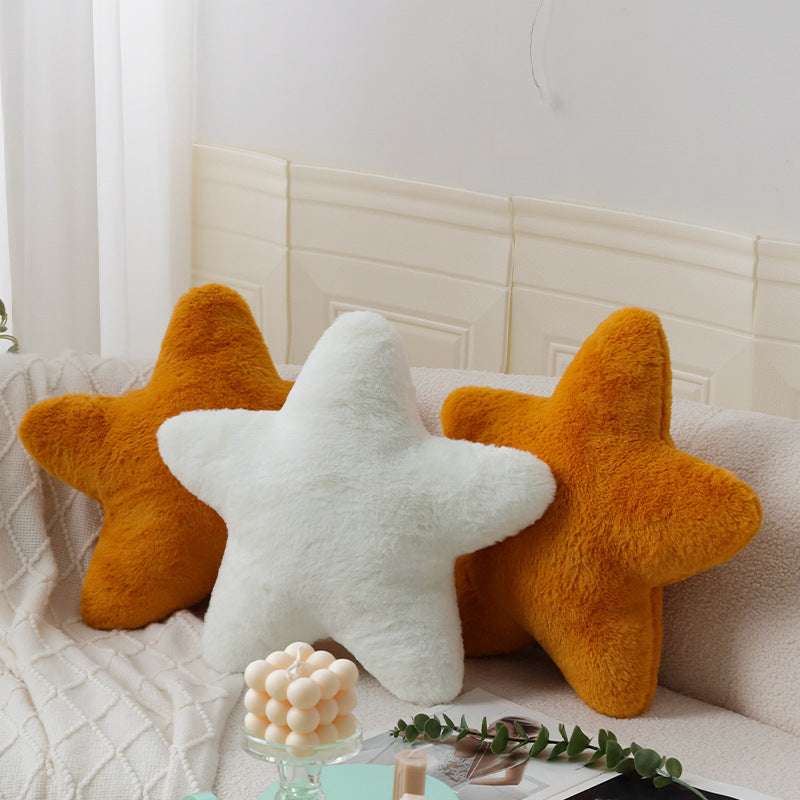 VibeCore Star Throw Pillow in three colors arranged on a couch, featuring a fun, coastal design with soft fabric and plush PP cotton fill.