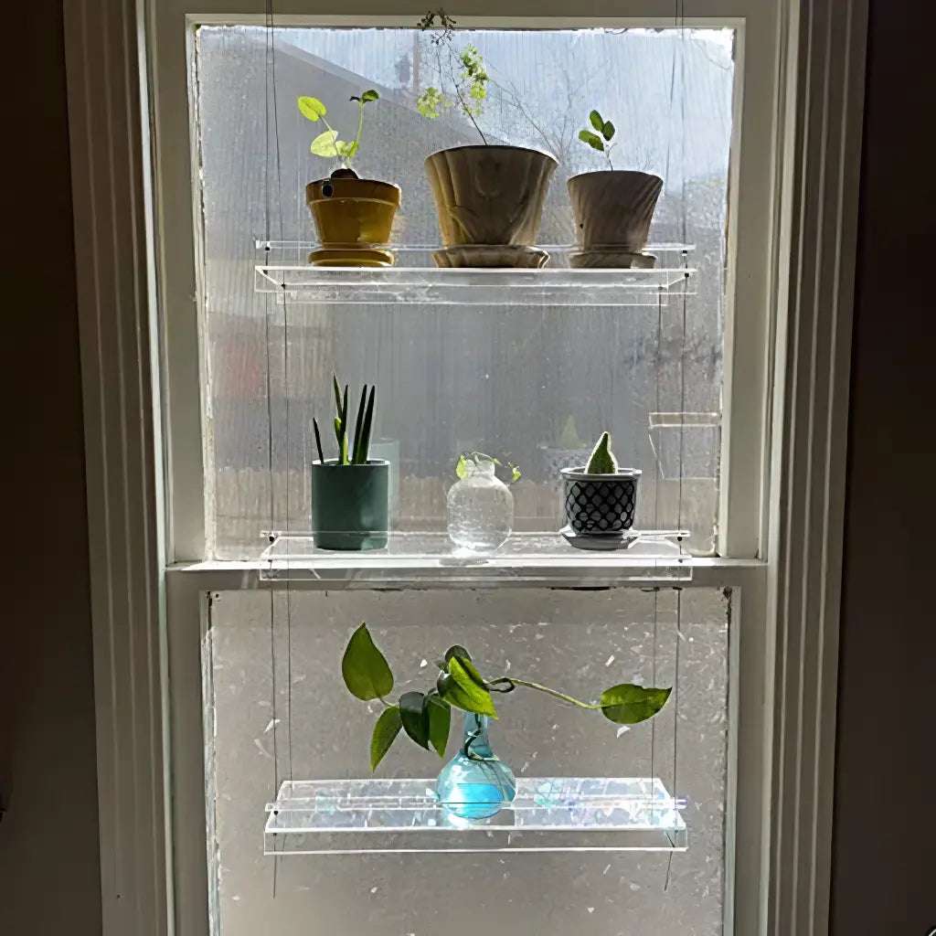VibeCore Transparent Hanging Plant Shelf with 3 shelves in a home, showcasing a durable acrylic build, adjustable cords, and stylish display for plants and decor.