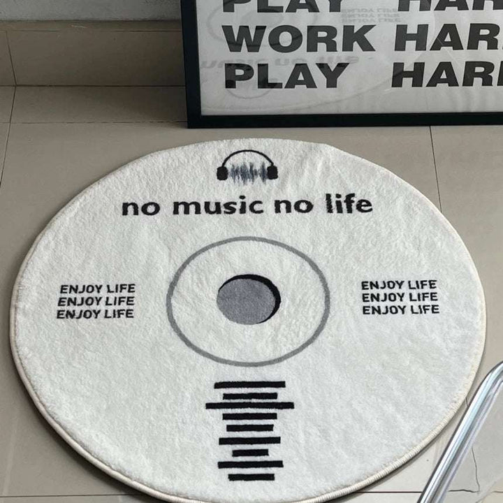 VibeCore White No Music Is Life Accent Rug Aerial View, featuring a bold minimalist CD design, white round rug, music lover decor, urban style, soft plush texture, modern, aesthetic, non-slip backing, comfortable, vibrant, unique rug for living room, bedroom, dorm.