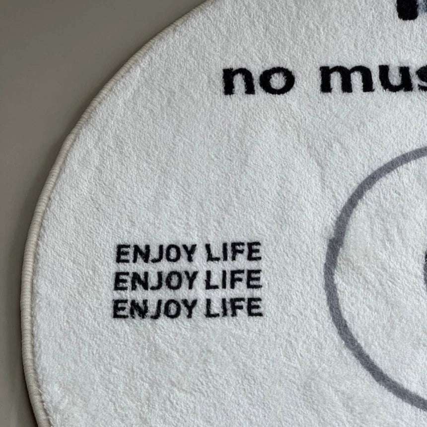 Close-up of VibeCore White No Music Is Life Accent Rug, showcasing detailed CD design with bold typography, soft texture, vibrant white background, and minimalist aesthetic, perfect for adding a stylish, modern vibe to any room, ideal for music lovers.