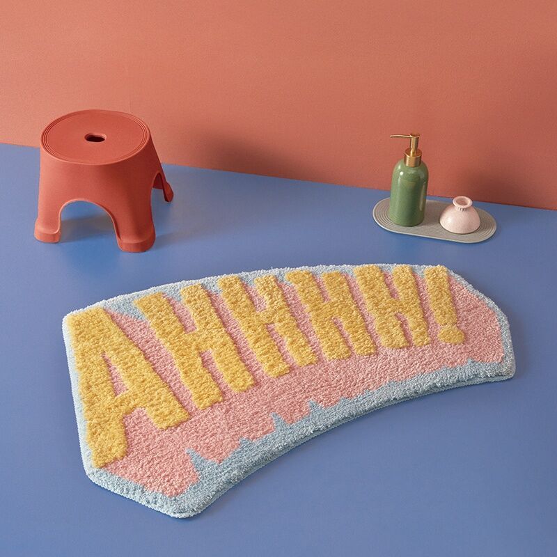 VibeCore AHHHH! Accent Rug featuring a bold and playful design, adding an energetic touch to any room with a plush texture and non-slip backing for safety. Perfect for adding a fun statement to living rooms, bedrooms, or dorms.