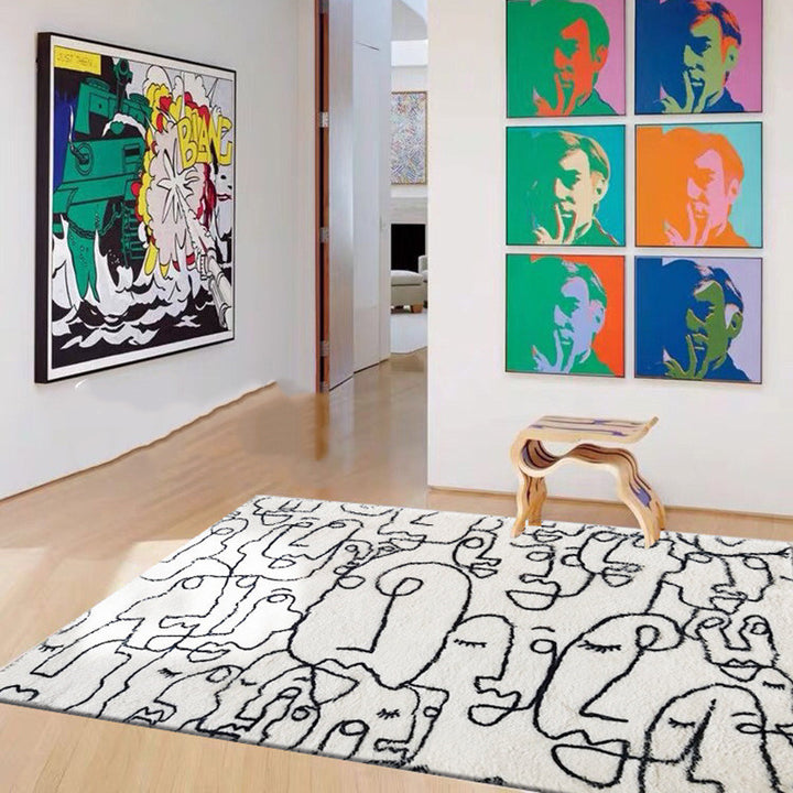 VibeCore Abstract Faces Rug, featuring a minimalist design with abstract face illustrations in black and white, adding a modern, artistic touch to any room.