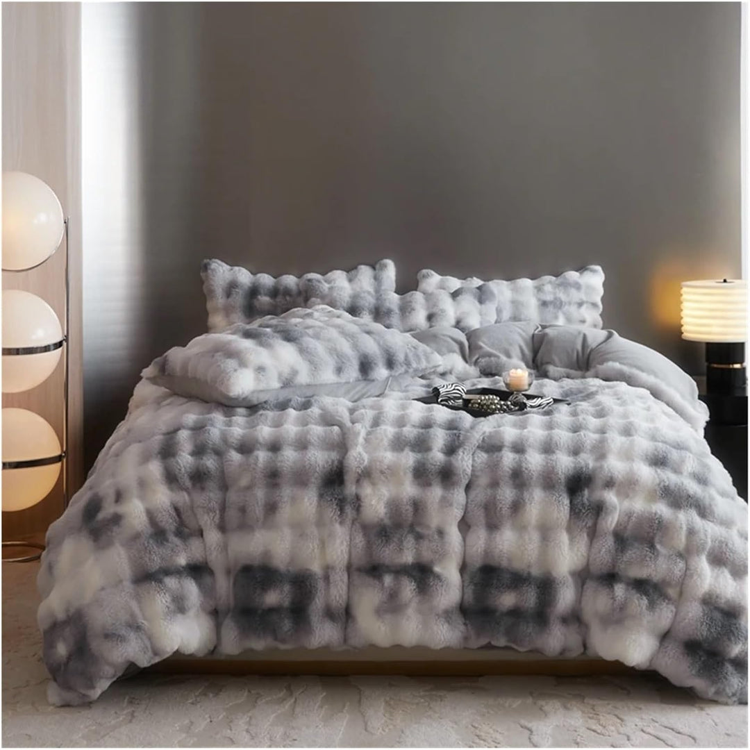 Aerial view of the 'Arctic Faux Fur Bedding Set' in Arctic Wolf, featuring its plush faux fur texture and warm, rich gray and white color. The luxurious fabric and cozy design create a sophisticated and inviting atmosphere in any bedroom or dorm.