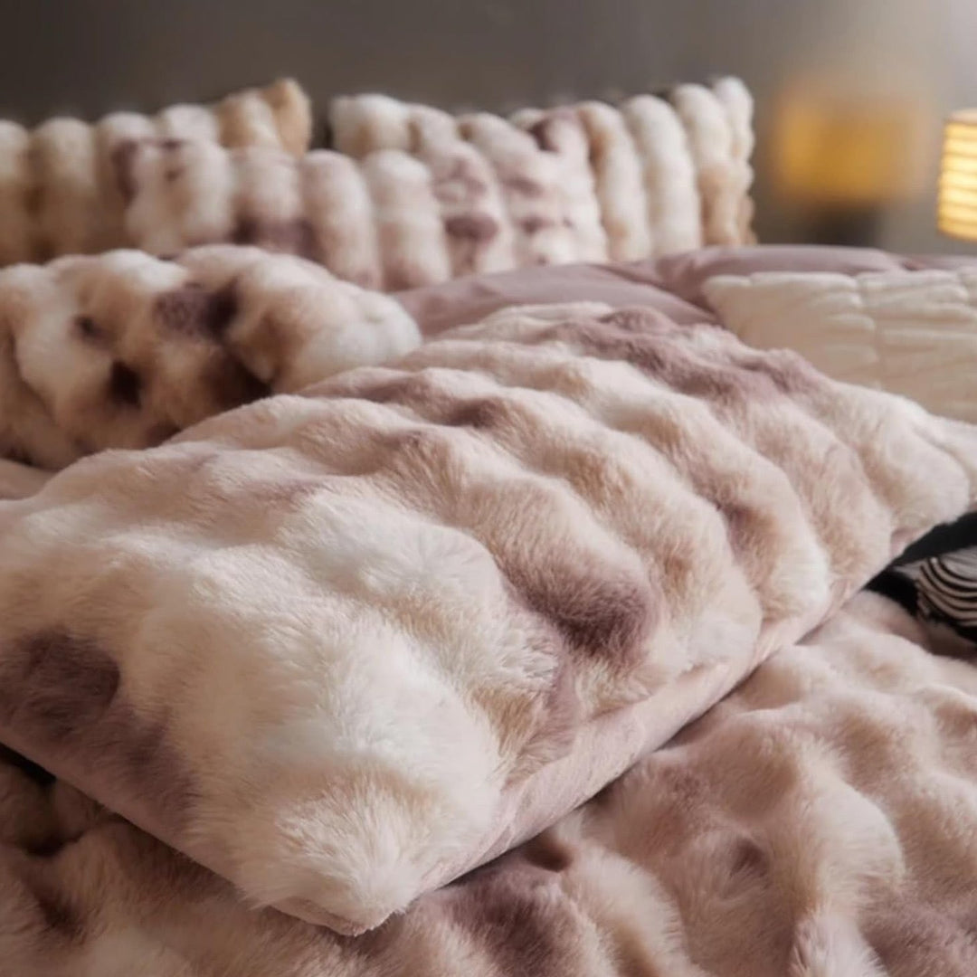Close-up of the plush pillow cover from the 'Arctic Faux Fur Bedding Set' in cinnamon, highlighting its soft, luxurious faux fur texture. The rich brown and beige color and velvety feel add a cozy and elegant touch to any bedroom or dorm.