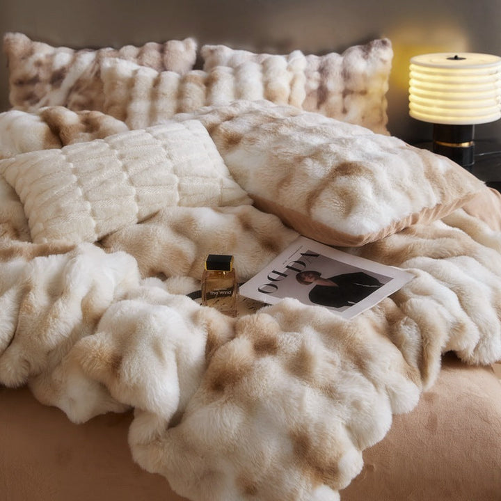 Front close-up photo of the 'Arctic Faux Fur Bedding Set' in Peach Wood, showcasing its luxurious, soft faux fur texture. The rich, warm orange-brown and beige color and plush fabric add a cozy, elegant touch to any bedroom, perfect for creating a stylish and inviting space.