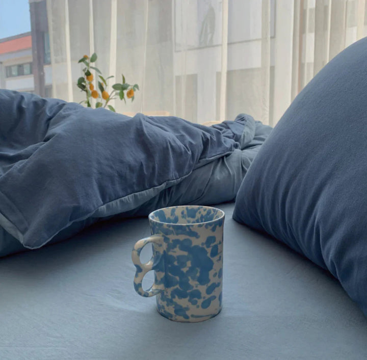 Close-up of the VibeCore Aesthetic Australian Cotton Duvet Cover Set in blue, showcasing the rich, vibrant color and soft texture of the premium Australian cotton fabric. The deep blue hue adds a calming, serene touch to any space while offering luxurious comfort and breathability.