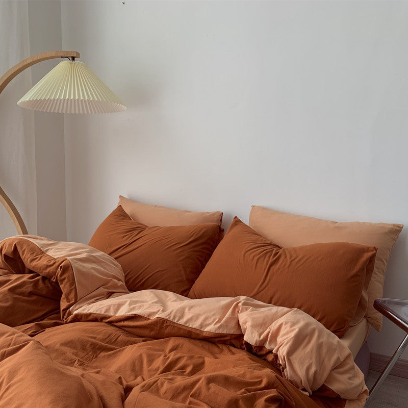 Side aerial view of the VibeCore Aesthetic Australian Cotton Duvet Cover Set in burnt orange, highlighting the soft, premium cotton fabric and vibrant color. The warm, earthy tone adds a cozy and inviting atmosphere to your bedroom, offering luxurious comfort and timeless style for any season.