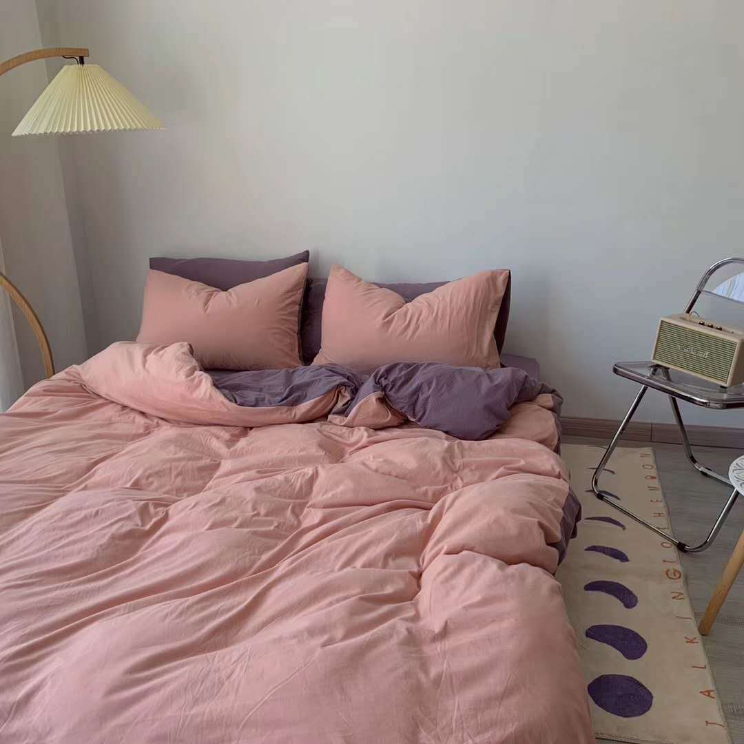 Aerial view of the VibeCore Aesthetic Australian Cotton Duvet Cover Set in light pink, showcasing the soft, premium cotton fabric and gentle pastel hue. The light pink color creates a calming, serene atmosphere in your bedroom, adding a touch of warmth and elegance while offering luxurious comfort.