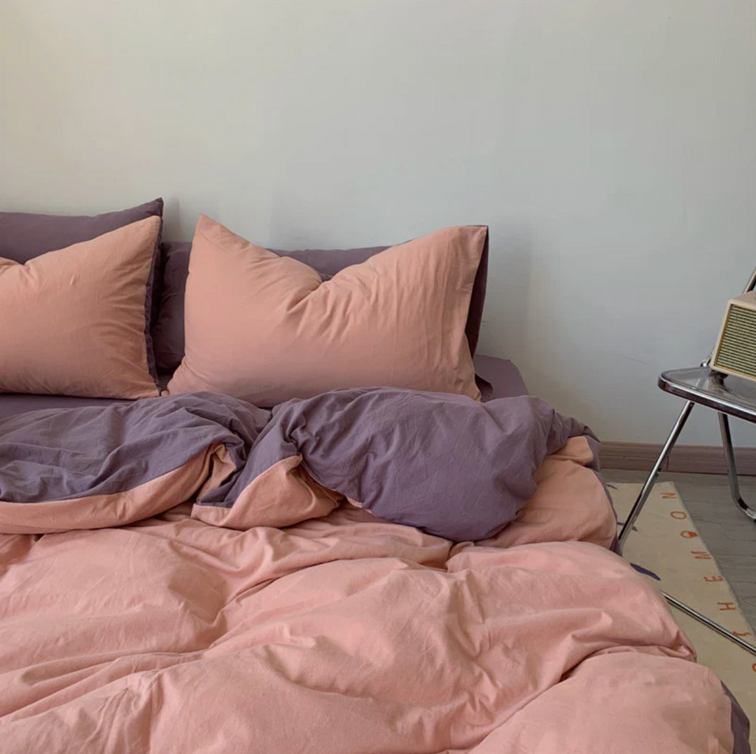 Front side view of the VibeCore Aesthetic Australian Cotton Duvet Cover Set in light pink, showcasing the smooth, high-quality Australian cotton fabric and the soft, pastel color. The duvet's clean, minimalist design adds a chic and calming touch to your bedroom, while offering long-lasting comfort and durability.