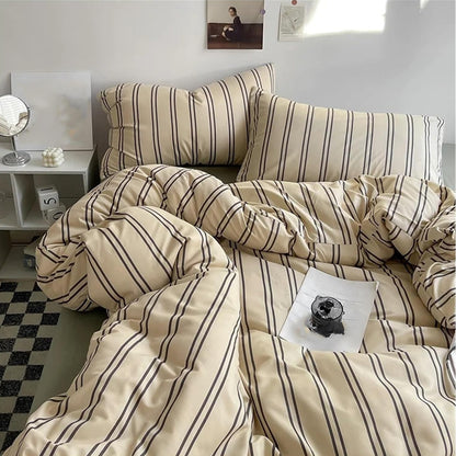 Aerial close-up of the VibeCore Aesthetic Beige Urban Stripe Duvet Cover Set, showcasing its sleek, modern stripe pattern in warm beige tones. Crafted from soft, breathable fabric, this duvet set adds a stylish, cozy touch to any bedroom or dorm.