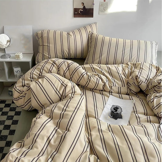 Aerial close-up of the VibeCore Aesthetic Beige Urban Stripe Duvet Cover Set, showcasing its sleek, modern stripe pattern in warm beige tones. Crafted from soft, breathable fabric, this duvet set adds a stylish, cozy touch to any bedroom or dorm.