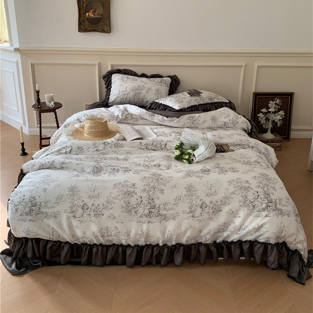 VibeCore Aesthetic Black Ruffles French Toile Duvet Cover Set with intricate black toile pattern and stylish ruffled edges, captured from an aerial view, showcasing its elegant design and luxurious texture.