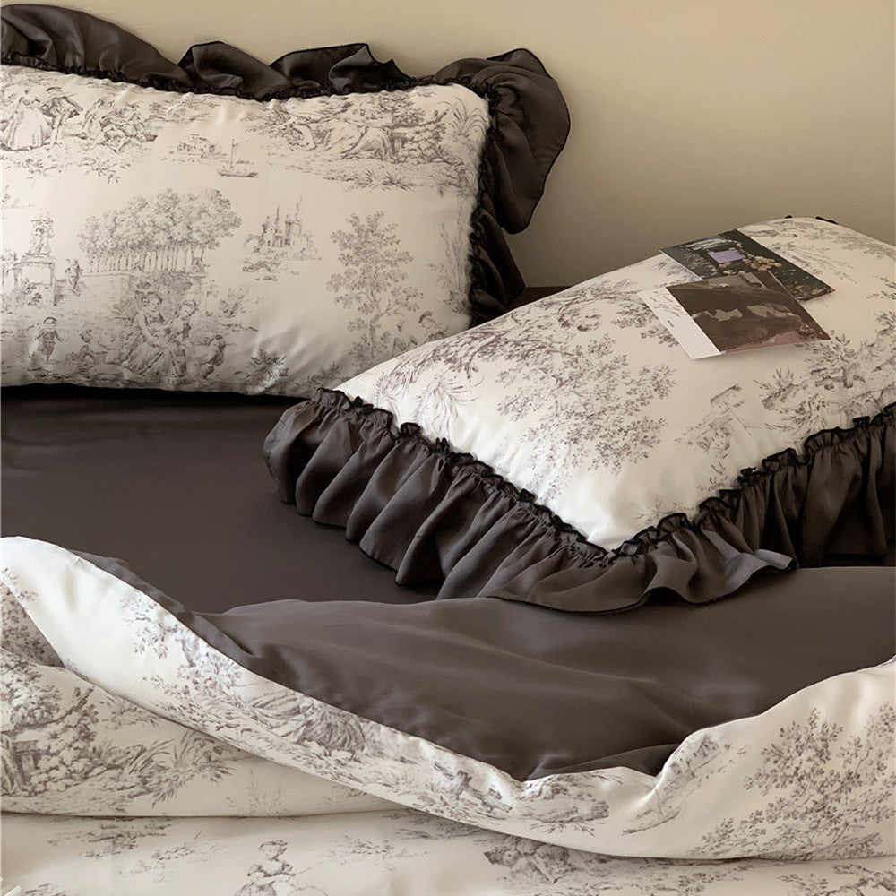 Close-up view of the VibeCore Aesthetic Black Ruffles French Toile Duvet Cover Set, featuring detailed black toile pattern and delicate ruffled edges, emphasizing its elegant texture and sophisticated design.