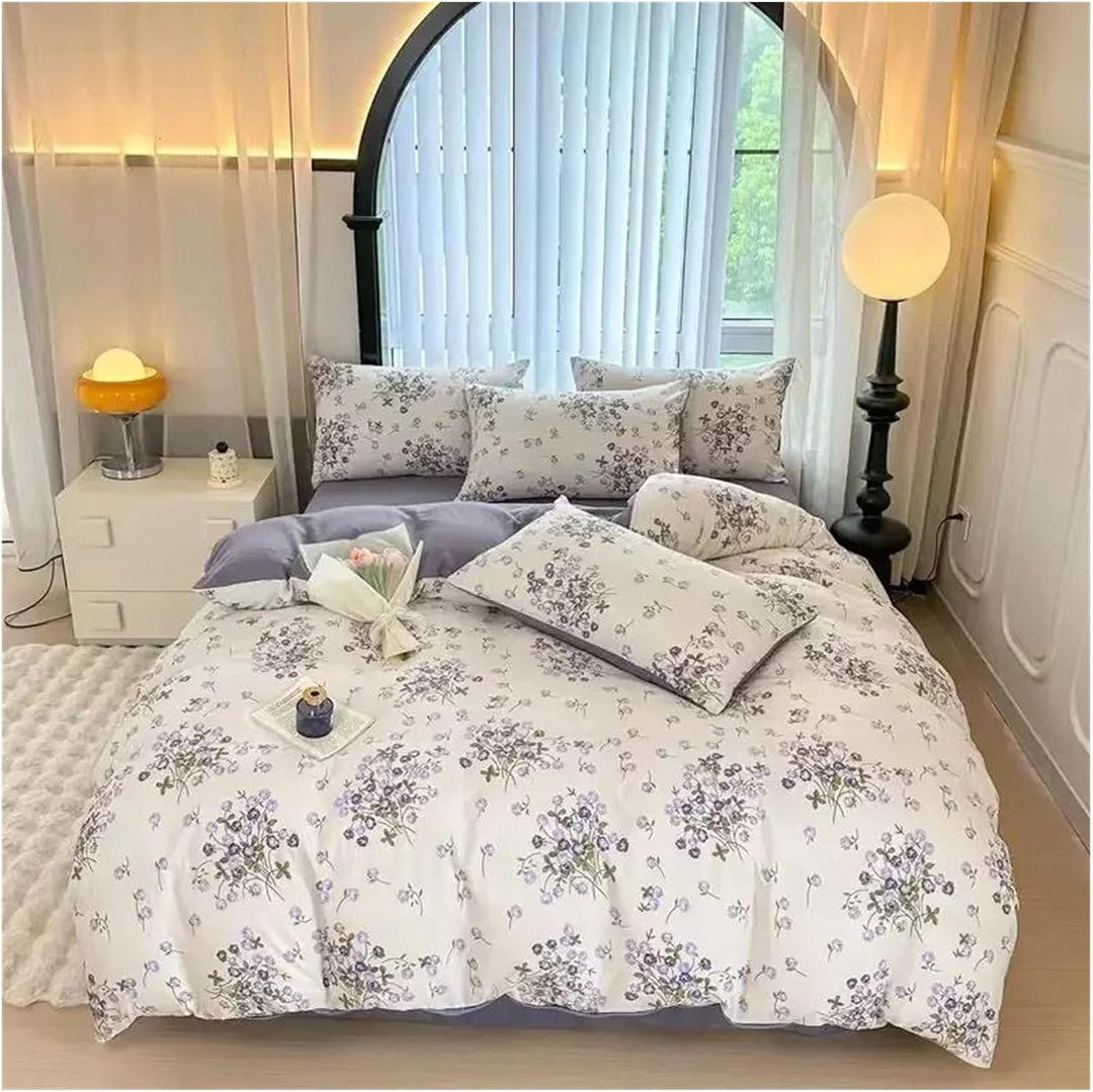 Aerial view of the VibeCore Aesthetic Blooming Lilacs Duvet Cover Set, featuring a soft lilac floral pattern that adds a calming and elegant touch to your bedroom or dorm decor.