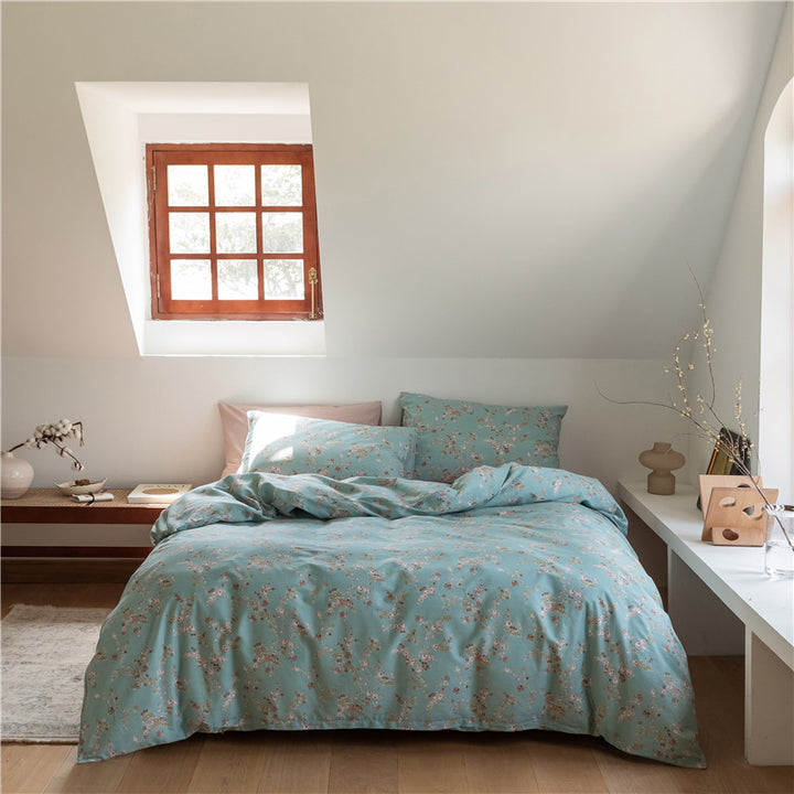 Aerial view of the VibeCore Aesthetic Blue Meadow Duvet Cover, featuring a delicate floral pattern in calming blue hues, designed to bring a peaceful, nature-inspired vibe to your bedroom or dorm.
