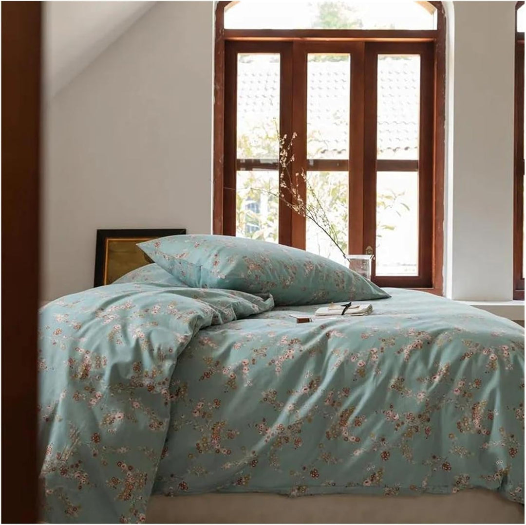 Close-up of the VibeCore Aesthetic Blue Meadow Duvet Cover, showcasing the intricate floral design and soft, breathable cotton fabric that adds a serene, nature-inspired touch to your bedroom or dorm decor.
