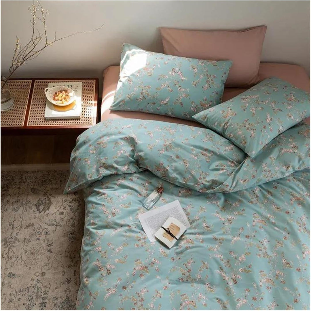 Close-up aerial view of the VibeCore Aesthetic Blue Meadow Duvet Cover, highlighting its delicate floral pattern and blue soft, breathable cotton fabric, bringing a calm, nature-inspired vibe to your space.