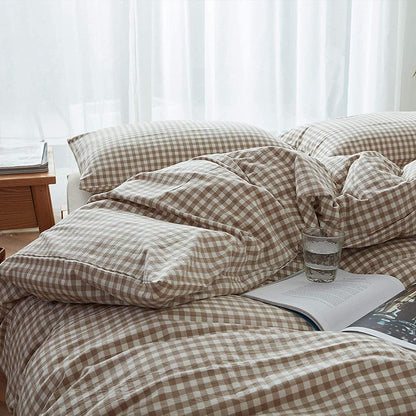 Close-up of the VibeCore Aesthetic Brown Gingham Duvet Cover Set, showcasing the classic brown gingham pattern with soft, textured fabric for a cozy and stylish addition to any bedroom or dorm.