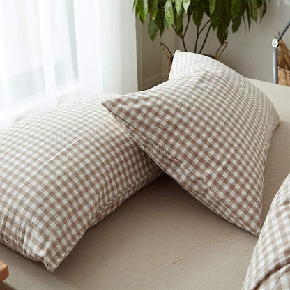Close-up of VibeCore Aesthetic Brown Gingham Duvet Cover Set pillowcases, featuring a classic brown gingham check pattern with a soft and breathable fabric for a cozy, aesthetic touch to your bed.