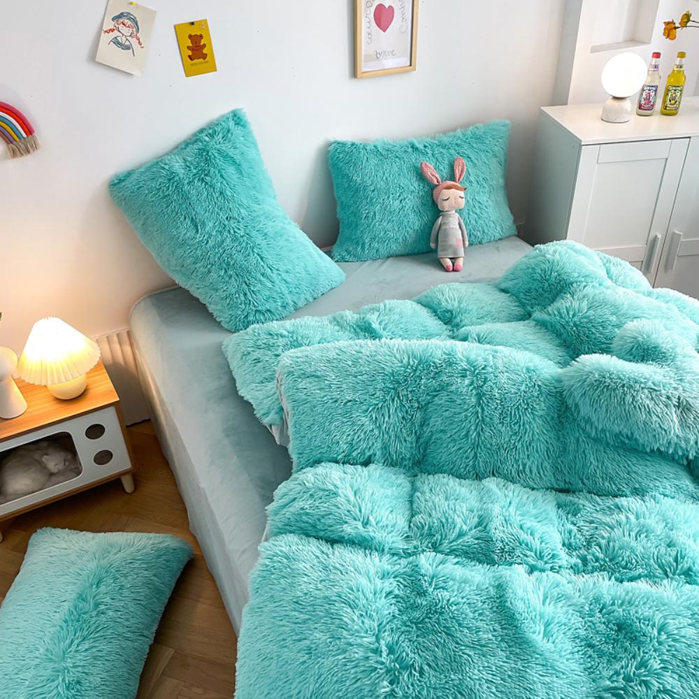 Alternative aerial view of the VibeCore Cloud9 Fleece Bedding Set in the color Aqua, showcasing ultra-soft fleece fabric for unmatched comfort and warmth. This vibrant bedding set adds a pop of color, cozy luxury, and modern style to your bedroom or dorm, creating the ultimate sleep environment.