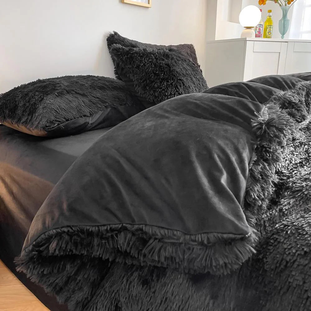 Close-up of the duvet cover from the VibeCore Cloud 9 Bedding Set in the color Black, featuring ultra-soft fleece fabric for ultimate comfort and cozy luxury. Perfect for adding warmth, style, and a plush feel to your bedroom or dorm, ideal for sleeping or relaxing.
