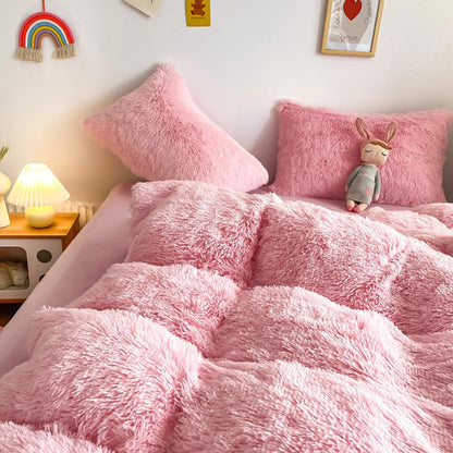 Close-up of the duvet cover from the VibeCore Cloud 9 Bedding Set in the color Light Pink, featuring ultra-soft fleece fabric for ultimate comfort and cozy luxury. Perfect for adding warmth, style, and a plush feel to your bedroom or dorm, ideal for sleeping or relaxing.