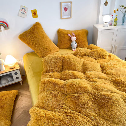 Left angle view of the VibeCore Cloud 9 Bedding Set in the color Mustard Yellow, featuring ultra-soft fleece fabric for unmatched comfort and warmth. This cozy bedding set adds a touch of luxury and style to your bedroom or dorm, perfect for relaxing and unwinding after a long, winter day.