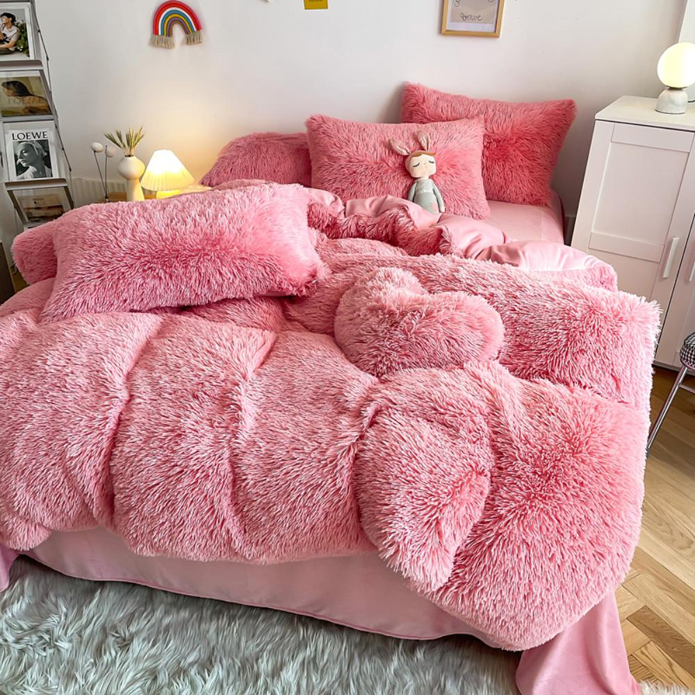 Alternative full side angle of the VibeCore Cloud 9 Bedding Set in the color Pink, featuring ultra-soft fleece fabric for ultimate comfort and luxurious warmth. This bedding set adds cozy style to your bedroom or dorm, perfect for creating a relaxing and inviting atmosphere.
