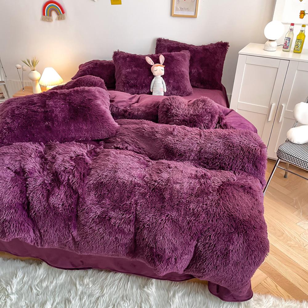 Another side angle of the VibeCore Cloud 9 Fleece Bedding Set in the color Purple, showcasing its ultra-soft fleece fabric for ultimate comfort and cozy warmth. Ideal for creating a fresh, inviting atmosphere in your bedroom or dorm, this bedding set adds both luxury and style.