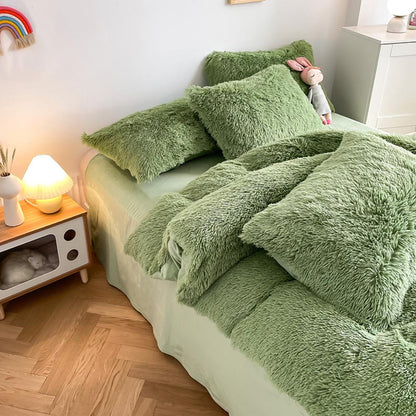 Left angle view of the VibeCore Cloud 9 Bedding Set in the color Sage, featuring ultra-soft fleece fabric for unmatched comfort and warmth. This cozy bedding set adds a touch of luxury and style to your bedroom or dorm, perfect for relaxing and unwinding after a long, cold day.